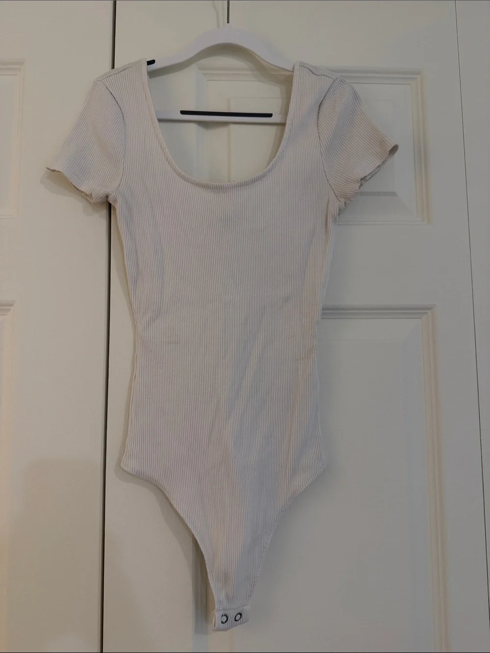 Express Ribbed Scoop Neck Short Sleeve Bodysuit in Off-White - Picture 1 of 4